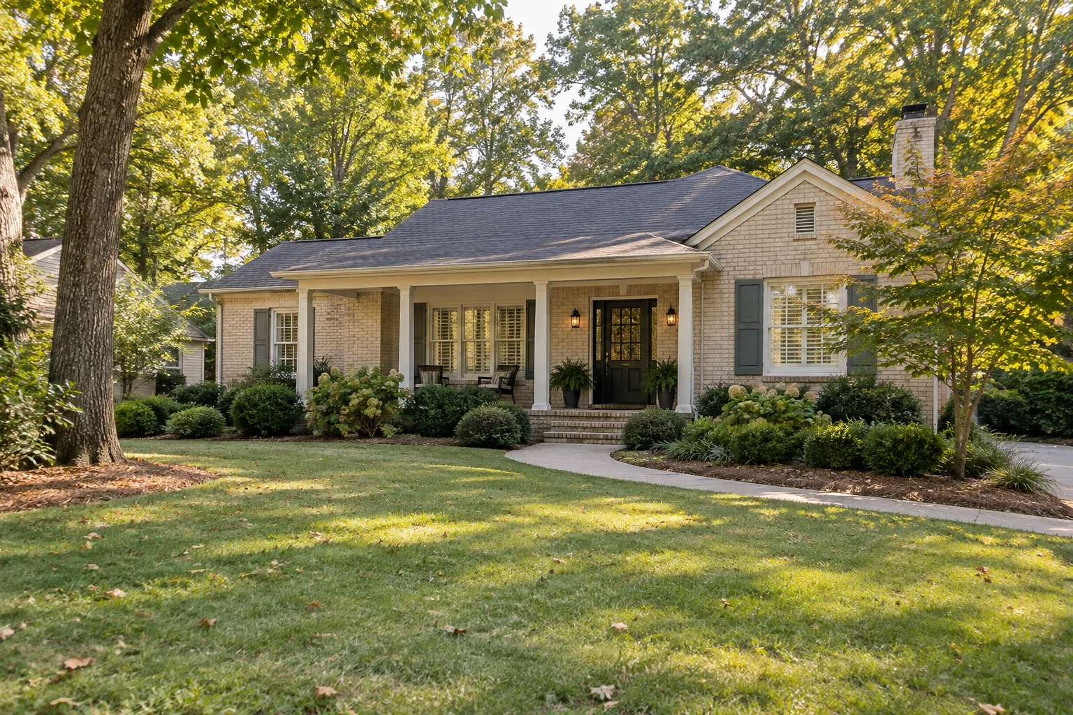 Illustration of a Georgia-style home beneath mature trees